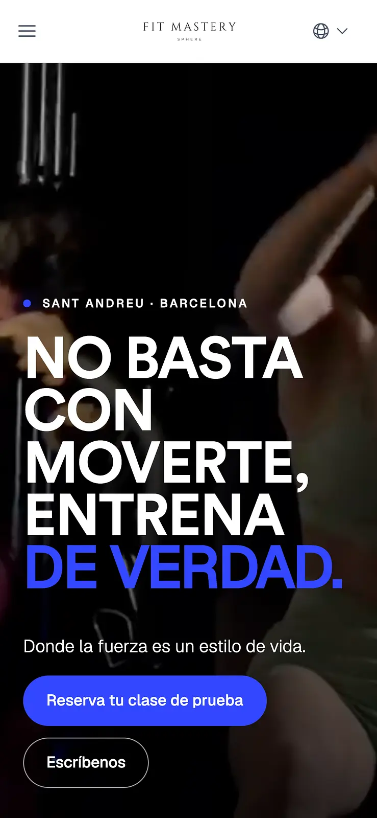 Fit Mastery Sant Andreu Barcelona webpage showing a dumbbell training image with promotional text and booking button