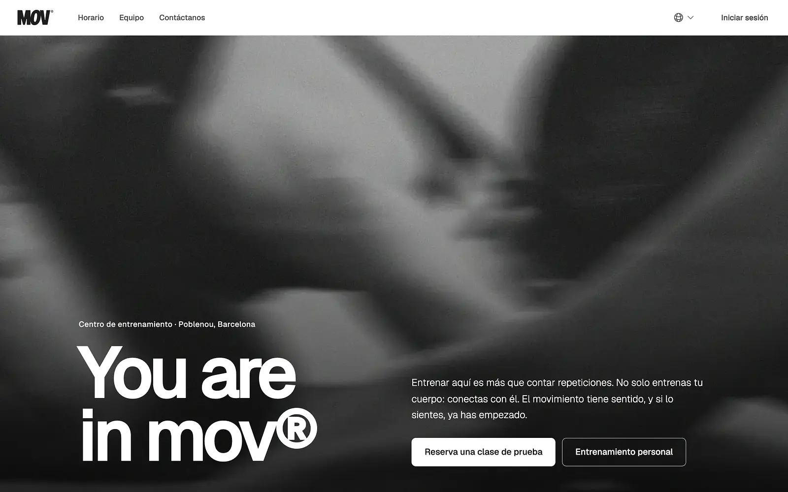 Website homepage for a fitness studio in Barcelona with movement-focused imagery and booking options
