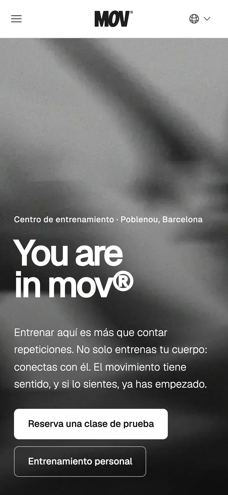 A webpage for mov® fitness studio showing the gym's branding and sign-up buttons